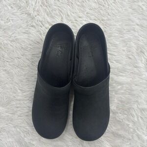 Black Dansko clogs with a chunky heel